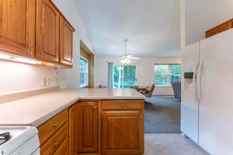 Tiny photo for 9479 Woodys Run, Traverse City, MI 49684 (MLS # 1949788)