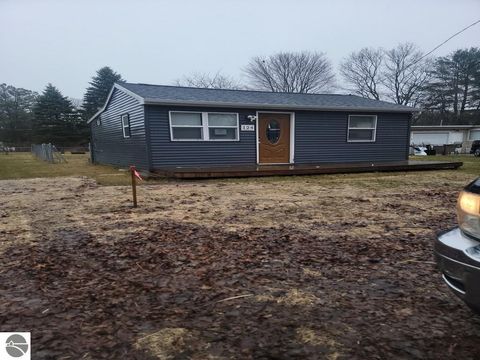 Photo of 124 N Wheeler St, Oscoda, MI 48750 (MLS # 1943737)