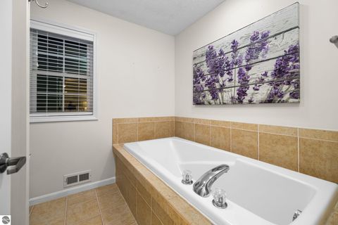 Tiny photo for 5466 Millbrook Drive #6, Williamsburg, MI 49690 (MLS # 1941832)