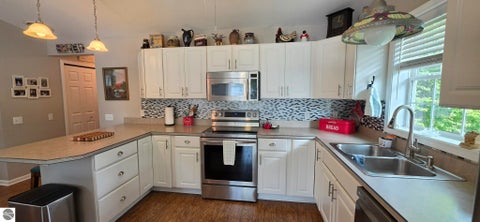 Tiny photo for 1015 E Lincoln ST #21, East Tawas, MI 48730 (MLS # 1949337)