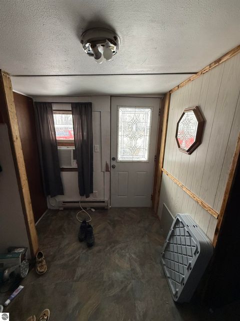 Tiny photo for 5681 M-66, Charlevoix, MI 49720 (MLS # 1943279)