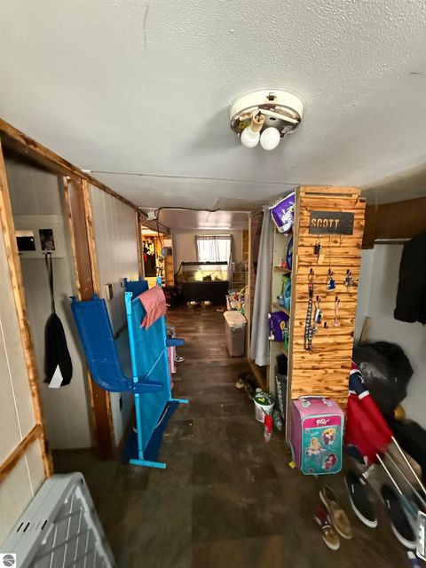 Tiny photo for 5681 M-66, Charlevoix, MI 49720 (MLS # 1943279)