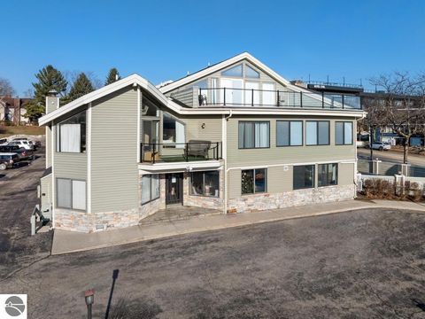 Tiny photo for 101 Michigan Avenue #101, Charlevoix, MI 49720 (MLS # 1941605)