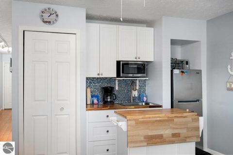 Tiny photo for 101 Michigan Avenue #101, Charlevoix, MI 49720 (MLS # 1941605)