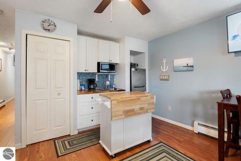 Tiny photo for 101 Michigan Avenue #101, Charlevoix, MI 49720 (MLS # 1941605)