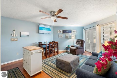 Tiny photo for 101 Michigan Avenue #101, Charlevoix, MI 49720 (MLS # 1941605)