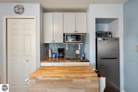 Tiny photo for 101 Michigan Avenue #101, Charlevoix, MI 49720 (MLS # 1941605)