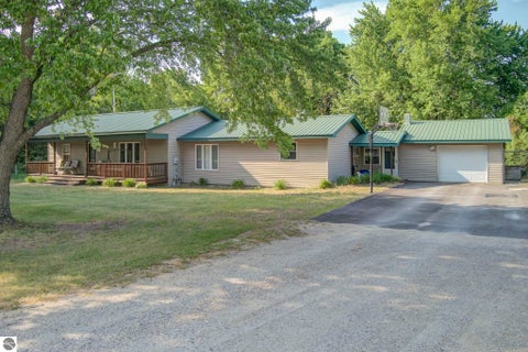 Photo of 4793 E Duck Lake Road, Grawn, MI 49637 (MLS # 1943602)