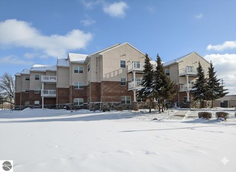 Photo of 301 N Lake Street #208, Cadillac, MI 49601 (MLS # 1941392)