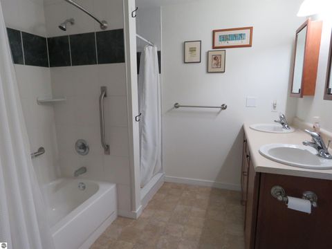 Tiny photo for 301 N Lake Street #208, Cadillac, MI 49601 (MLS # 1941392)