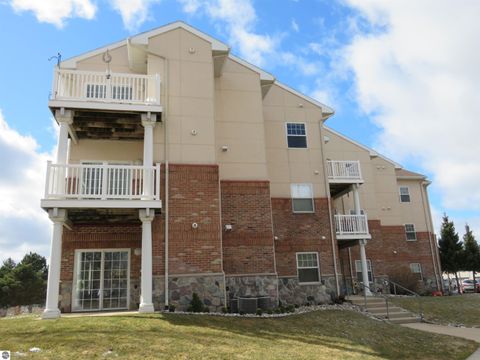 Tiny photo for 301 N Lake Street #208, Cadillac, MI 49601 (MLS # 1941392)