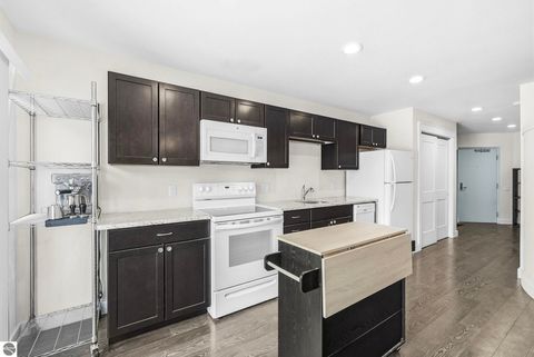 Tiny photo for 124 Beech Street #101, Traverse City, MI 49684 (MLS # 1942298)