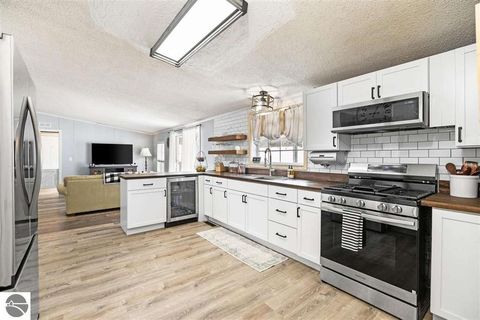 Tiny photo for 305 N Advance Road, East Jordan, MI 49727 (MLS # 1943081)