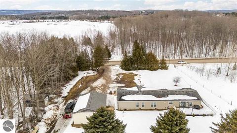 Tiny photo for 305 N Advance Road, East Jordan, MI 49727 (MLS # 1943081)