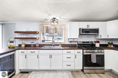 Tiny photo for 305 N Advance Road, East Jordan, MI 49727 (MLS # 1943081)