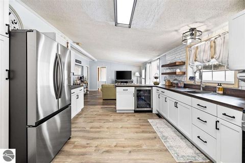 Tiny photo for 305 N Advance Road, East Jordan, MI 49727 (MLS # 1943081)