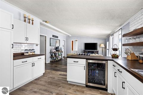 Tiny photo for 305 N Advance Road, East Jordan, MI 49727 (MLS # 1943081)