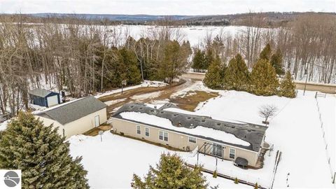 Tiny photo for 305 N Advance Road, East Jordan, MI 49727 (MLS # 1943081)