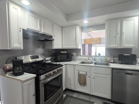 Tiny photo for 707 Sawyer St, East Tawas, MI 48730 (MLS # 1944242)