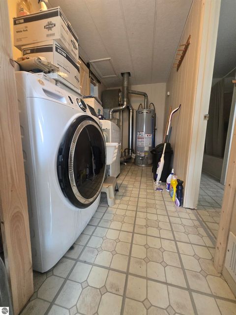 Tiny photo for 707 Sawyer St, East Tawas, MI 48730 (MLS # 1944242)