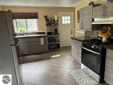 Tiny photo for 21 W Oak Street, Au Gres, MI 48703 (MLS # 1950353)