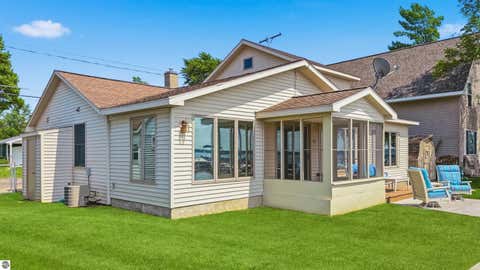 Tiny photo for 1027 E Lake Mitchell Drive, Cadillac, MI 49601 (MLS # 1947851)