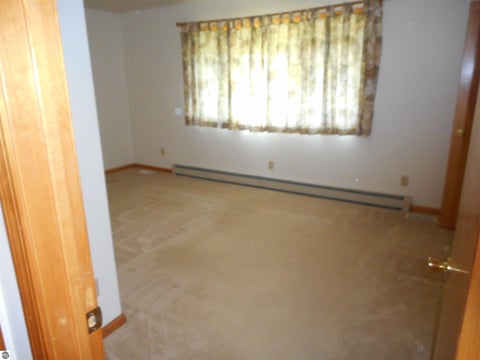 Tiny photo for 1001 Wintergreen Street, East Tawas, MI 48730 (MLS # 1949273)