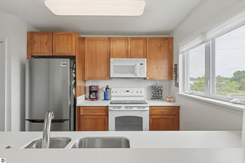Tiny photo for 1122 Lake Ridge Drive #301, Traverse City, MI 49684 (MLS # 1946406)