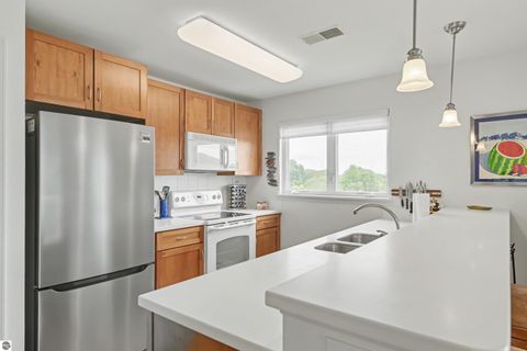 Tiny photo for 1122 Lake Ridge Drive #301, Traverse City, MI 49684 (MLS # 1946406)