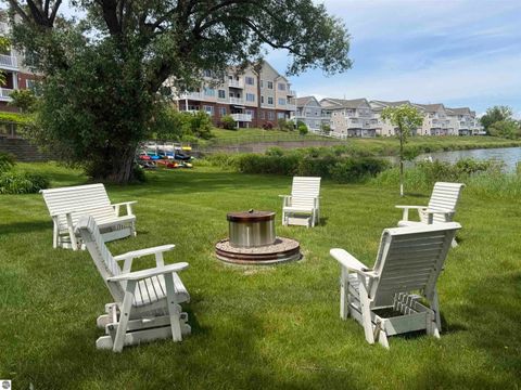 Tiny photo for 1122 Lake Ridge Drive #301, Traverse City, MI 49684 (MLS # 1946406)
