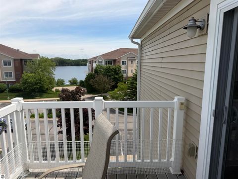 Tiny photo for 1122 Lake Ridge Drive #301, Traverse City, MI 49684 (MLS # 1946406)