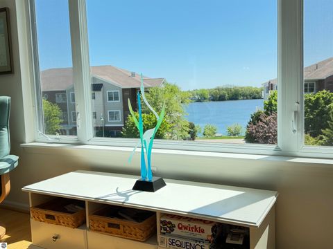 Tiny photo for 1122 Lake Ridge Drive #301, Traverse City, MI 49684 (MLS # 1946406)