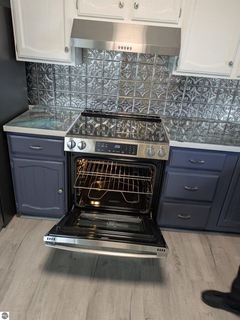 Tiny photo for 408 Sunnyside Street, Mancelona, MI 49659 (MLS # 1944172)