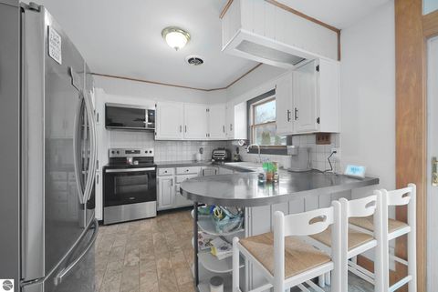 Tiny photo for 4856 M-55, Cadillac, MI 49601 (MLS # 1942979)