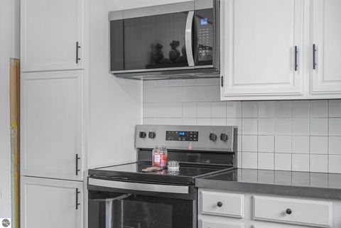 Tiny photo for 4856 M-55, Cadillac, MI 49601 (MLS # 1942979)