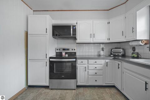 Tiny photo for 4856 M-55, Cadillac, MI 49601 (MLS # 1942979)