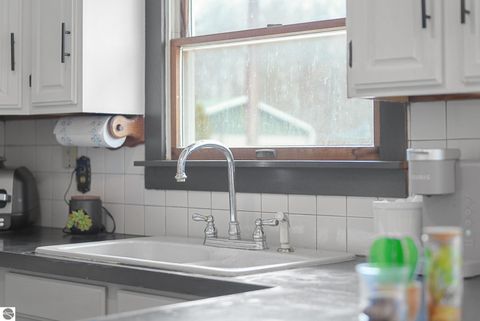 Tiny photo for 4856 M-55, Cadillac, MI 49601 (MLS # 1942979)