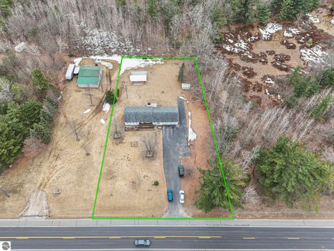 Tiny photo for 4856 M-55, Cadillac, MI 49601 (MLS # 1942979)