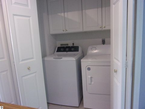 Tiny photo for 915 W Lake Street, Tawas City, MI 48763 (MLS # 1943456)