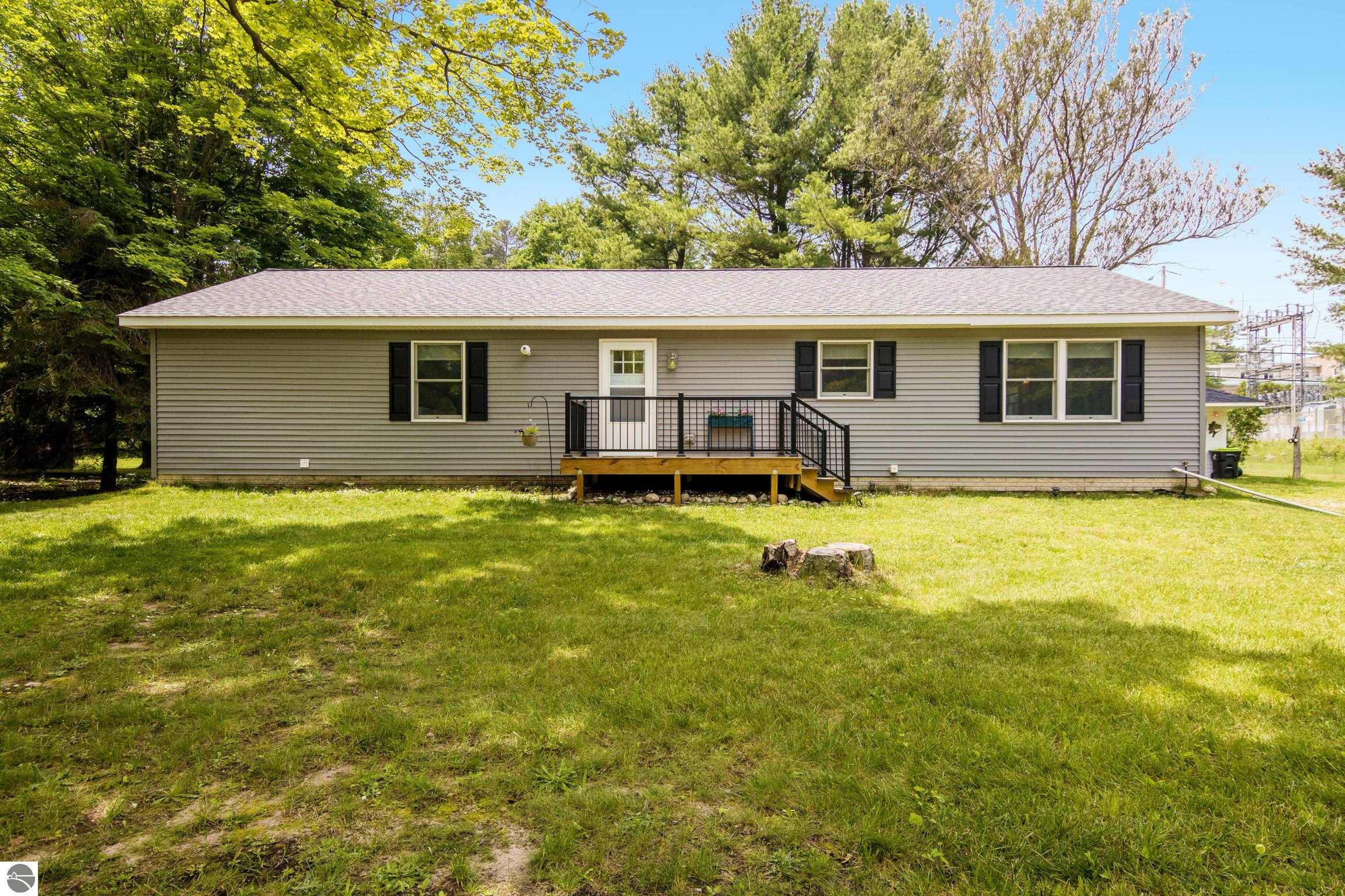 Photo 1 of 24 — 310 S Shabwasung Street, Northport, MI 49670