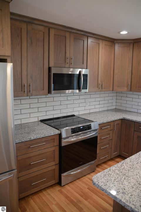 Tiny photo for 12000 Barkley Lane #3, Rapid City, MI 49676 (MLS # 1946178)