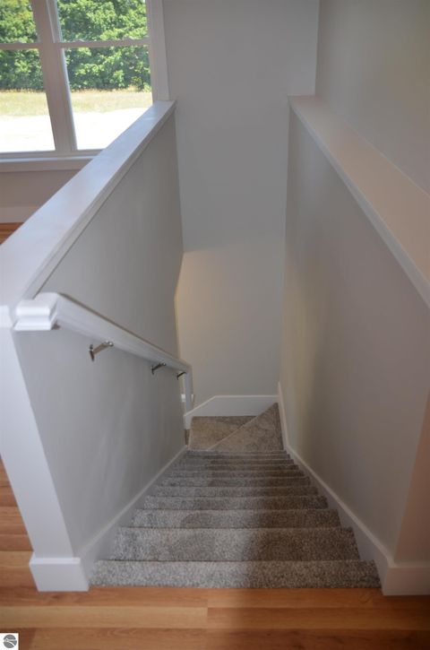 Tiny photo for 12000 Barkley Lane #3, Rapid City, MI 49676 (MLS # 1946178)