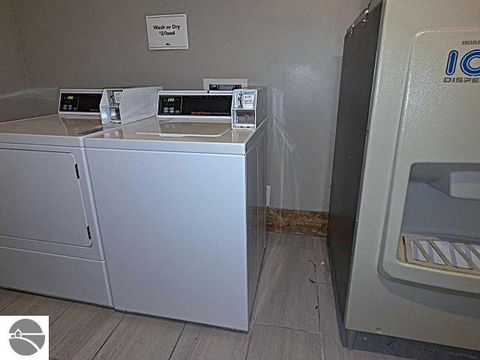 Tiny photo for 2400 Troon South #4214, Bellaire, MI 49615 (MLS # 1941644)