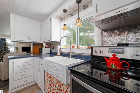 Tiny photo for 10595 E M-42, Manton, MI 49663 (MLS # 1944637)