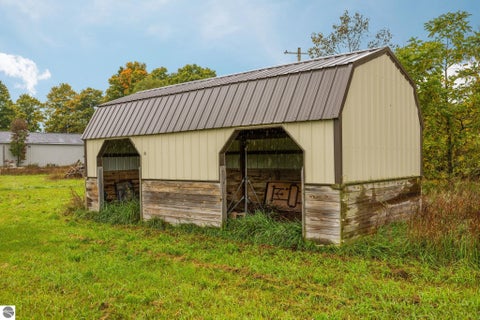 Tiny photo for 203 S Pioneer Road, Beulah, MI 49617 (MLS # 1951259)