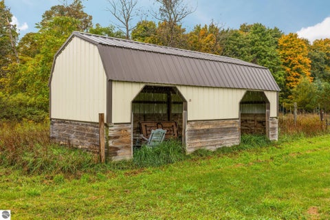 Tiny photo for 203 S Pioneer Road, Beulah, MI 49617 (MLS # 1951259)