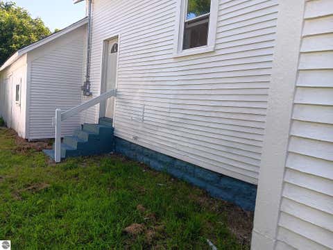 Tiny photo for 220 E State Street, Mancelona, MI 49659 (MLS # 1949403)