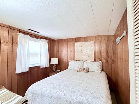 Tiny photo for 724 S Golden Beach Drive, Kewadin, MI 49648 (MLS # 1945453)