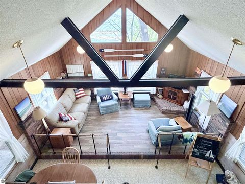 Tiny photo for 724 S Golden Beach Drive, Kewadin, MI 49648 (MLS # 1945453)