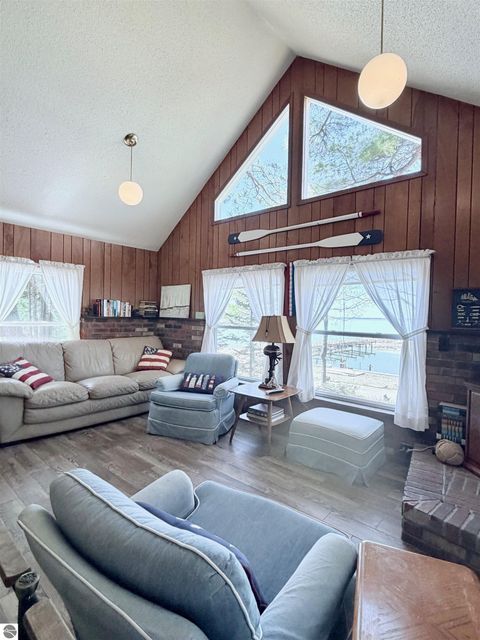 Tiny photo for 724 S Golden Beach Drive, Kewadin, MI 49648 (MLS # 1945453)